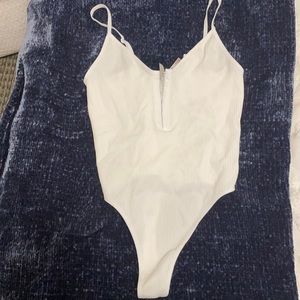 Never worn white body suit